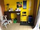 a room with a desk and a chair in it