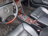 a car dashboard with a steering wheel and a dash board