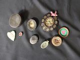 a lot of small objects that are on a black surface