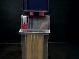 une image représentant un juke-box surmonté d'un téléviseur