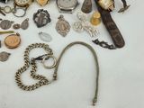 many different types of watches and bracelets on the table