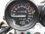a close up of a speedometer on a motorcycle