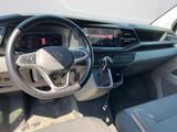 the interior of a car with a steering wheel and dashboard controls
