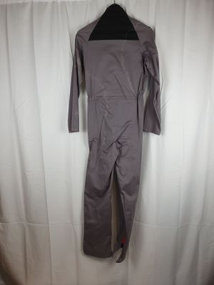 the back of a gray suit hanging on a white curtain