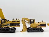 three toy excavators sitting next to each other on a white surface