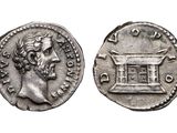 a silver coin with an image of a man on it