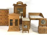 several pieces of furniture that are sitting on a white surface