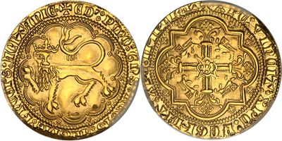 une pièce d'or sur laquelle est représenté un lion