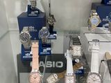 a lot of watches on display in a glass case