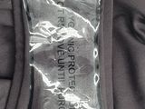 a bottle of water in the back pocket of a jacket