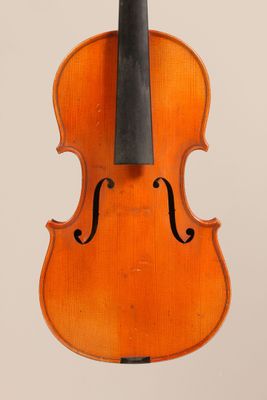 an old violin with a bow on a white background