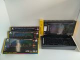 three laptops that are sitting on a table