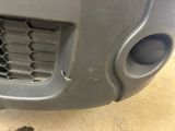 a close up of the front bumper of a car