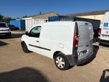 a white van that is parked in a parking lot