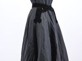 an image of a woman ' s dress on a mannequin stand