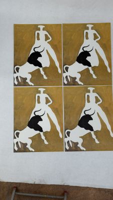 four pictures of a man riding a bull on a wall