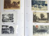 an open book with a bunch of old photos on it