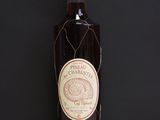 a bottle of wine that is sitting on a table