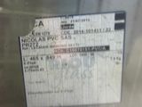 a picture of a close up of a ticket on a machine