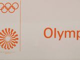an olympic ticket with the olympic logo on it