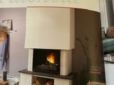 a book with a picture of a fireplace in the middle of it