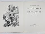 an open book with a drawing of a man and a woman on it