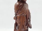 an image of a statue of a person with a hat on