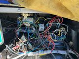 a car that has a lot of wires on the inside of it