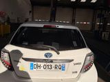 a white car that is parked in a garage