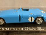 a blue model of a car in a clear case