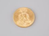 an image of a gold coin on a white surface