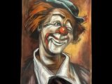 tableau représentant un clown au nez rouge et au chapeau vert