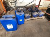 two blue plastic containers sitting next to each other on a pallet