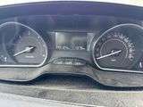 a close up of a car dashboard with a speedometer and gauges