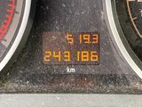 two gauges on the dashboard of a car with numbers on them