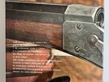 a book with a picture of a gun and a pair of pliers