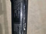 an image of a close up of a bicycle handlebar with a label on it