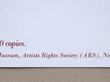 a picture of a business card with a picture of a plane