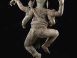 an image of a statue of a man with arms outstretched