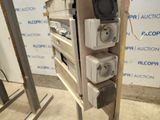 an image of a bunch of electrical equipment sitting on top of a metal stand