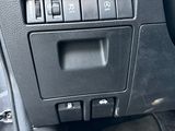 a close up of a car ' s dashboard with the controls on
