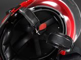 a close up of a helmet on a black background
