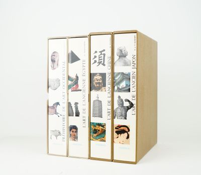 two cardboard boxes with pictures of different people on them on a white surface