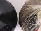 two pairs of shoes that have been wrapped in plastic
