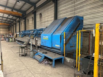 a large machine that is sitting in a warehouse