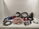 a lot of wires and cords on the counter