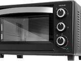 an image of a black toaster oven on a white background