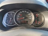 a close up of a car dashboard with a speedometer and gauges