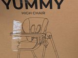 an image of a cardboard box with a picture of a baby ' s high chair in it