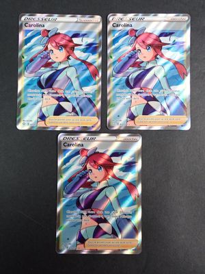 trois cartes à collectionner Pokémon issues du jeu de cartes à collectionner Pokémon